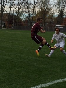 Kyle Pelachowsky attempts to deflect the ball.