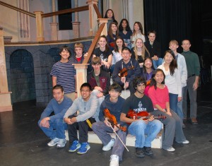 Members of the Honors Orchestra prepare for their concert on Sunday