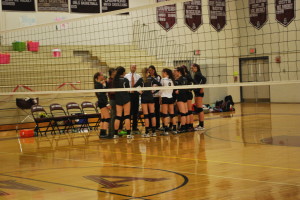 The team huddles during a timeout.