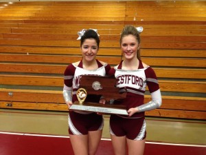 Seniors Kaitlin Canha (left) and Ali Loftus (right) holding the second place trophy.