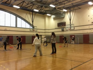 students prepare for floor hockey to start up for a second session