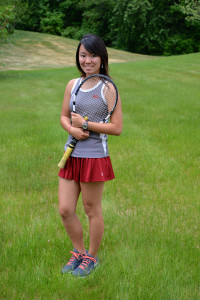 Claire Yu, a member of the varsity tennis team.